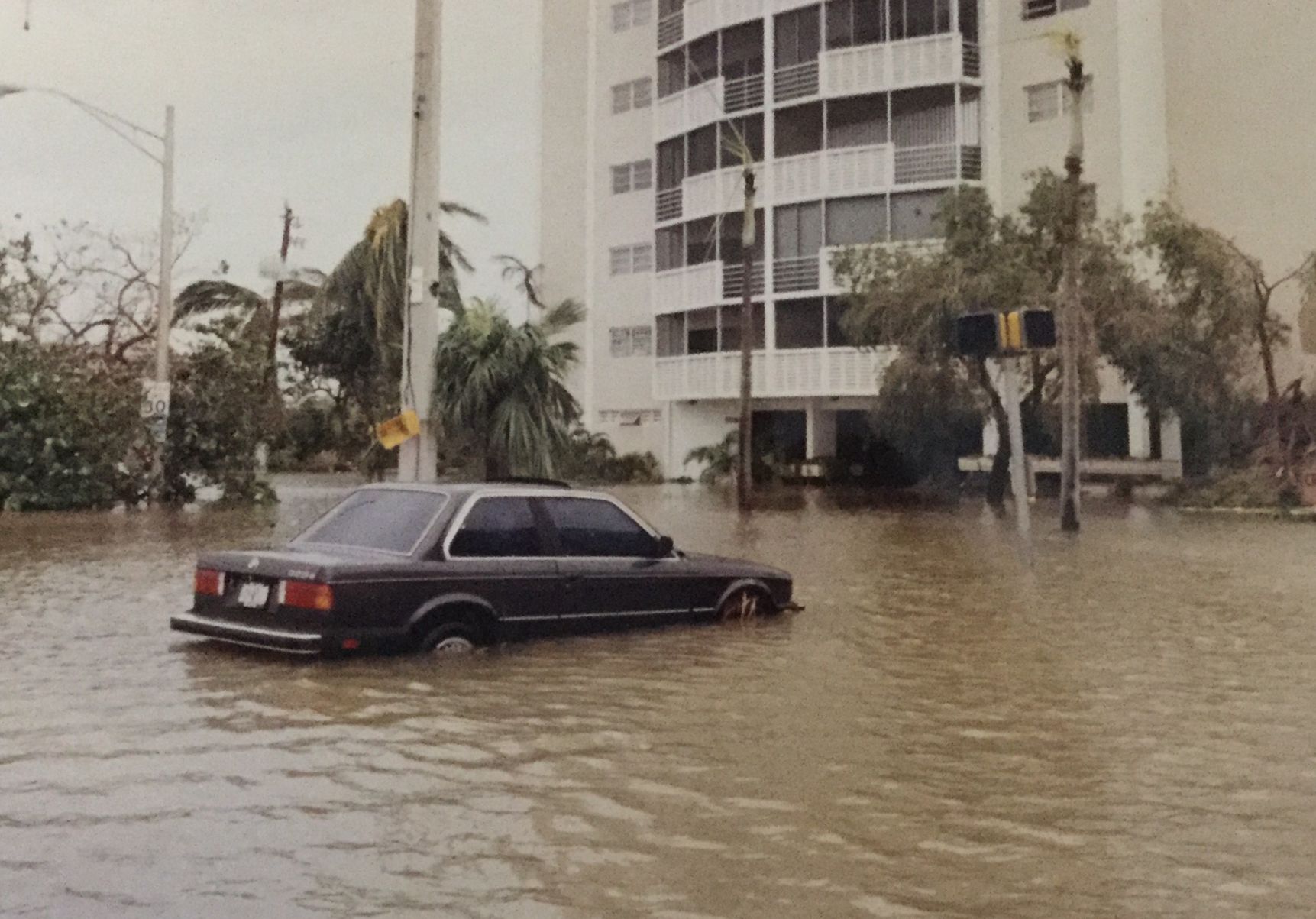 Flooded streets and cars hours after Hurricane Andres hit Key Biscayne